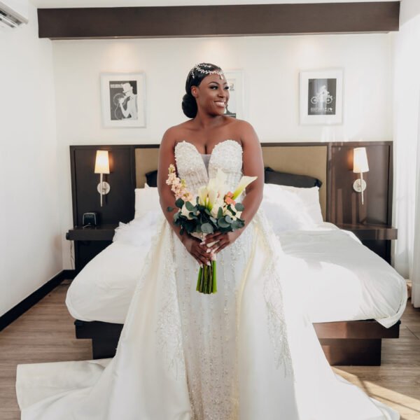 Bespoke strapless wedding gown with lace detailing and detachable train - Rebirth Couture.